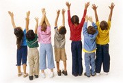 Children reaching up into air