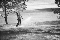 Photo of man playing golf