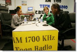 Mrs. Laura Bush participates in a radio interview with Amber Bellamy, age 17, left, and Elliott White, Jr., age 22, Wednesday, October 4, 2006, during a visit to the Children’s Training Network/AM 1700 Radio Program in Buffalo, New York, as part of the President’s Helping America’s Youth initiative. Together with Crucial Human Service Center and other Buffalo community programs, AM 1700 Station encourages caring adults to connect as mentors with high-risk youth. White House photo by Shealah Craighead