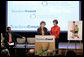 Mrs. Laura Bush stands with her second grade teacher, Charlene Gnagy, as Mrs. Gnagy speaks to the audience Thursday, October 5, 2006, during the TeachersCount “Behind every famous person is a fabulous teacher” PSA campaign launch ceremony in New York City. The campaign is to help create awareness for teachers and the role they play in the lives of children and to raise the status of the teaching profession. White House photo by Shealah Craighead