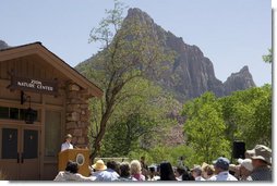 Mrs. Laura Bush delivers remarks, Sunday, April 29, 2007, during the rededication ceremony of the Zion National Park Nature Center in Springdale, Utah. Zion was Utah’s first National Park, originally established as Mukuntuweap National Monument and change to Zion National Monument in 1919. High plateaus, a maze of narrow, deep sandstone canyons and striking rock towers and mesas characterize the park. White House photo by Shealah Craighead