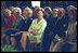 Laura Bush, Lynne Cheney and others laugh with Melissa Gilbert, right, who portrayed Laura Ingalls Wilder, in Little House on the Prairie series, based on Wilder's books, during the White House Symposium on Women of the West, September 17, 2002.