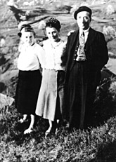 Simone Arnold Liebster (middle) poses for a photograph with her parents, Emme and Adolphe Arnold, 1947.