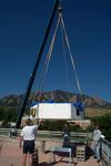 Removing the completed antenna from the roof of the Boulder Labs for field tests outside Boulder.