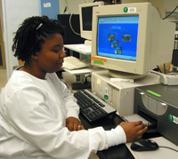 Keisha uses a spectrophotometer to determine the concentration of E. Coli cells in a batch of media.