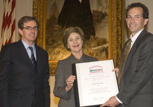 From left, Dr. James Basker, President of the Gilder Lehrman Institute; Mrs. Laura Bush; and David Mitchell, Preserve America History Teacher of the Year