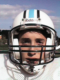 The standard head and face protection for football players includes a helmet and a mouth guard. 