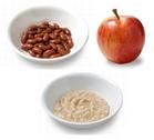 Photo of foods high in soluble fiber such as apples, kidney beans and oatmeal. - Click to enlarge in new window.