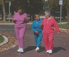 Photo of three women walking. - Click to enlarge in new window.