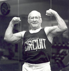 Photo of Ed Brunetti, 71, flexing his muscles. - Click to enlarge in new window.