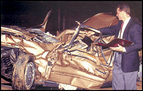 Photo of a car severely damaged in an accident,