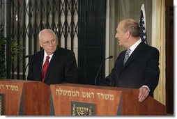 Vice President Dick Cheney looks on as Prime Minister of Israel Ehud Olmert delivers a statement Saturday, March 22, 2008 during a press availability at the prime minister's residence in Jerusalem. The Vice President is scheduled to meet with both Israeli and Palestinian leadership over Easter weekend to discuss President Bush's commitment to a two state solution for Israeli-Palestinian peace. White House photo by David Bohrer