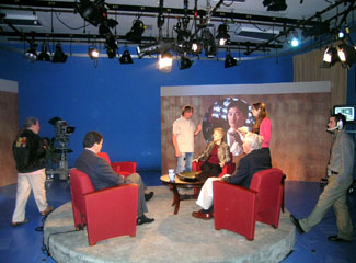 Scene from the set: NIH director Dr. Elias Zerhouni and the institute and center directors bring the agency’s research to the public in their homes through a new televised health series, <em>Tomorrow’s Medicine Today</em>.