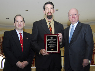 ORF’s Greg Leifer (c) accepts conservation honors from Secretary of Energy Samuel Bodman (r) and Assistant Secretary Alexander Karsner.
