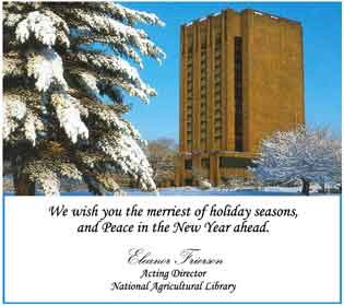 Snow falls on the National Agricultural Library. Below is the greeting 'We Wish You the Merriest of Holiday Seasons and Peace in the New Year Ahead