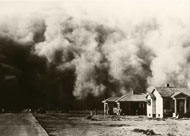 A house being overwhelmed by a dust storm