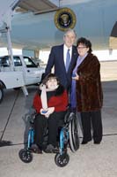 President George W. Bush presented the President’s Volunteer Service Award to mother and daughter Lidia and Becky Oprean upon arrival in Waco, Texas, on Friday, December 12, 2008.  The Opreans are founders and volunteers with Becky’s Hope Ministries.  To thank them for making a difference in the lives of others, President Bush honors a local volunteer when he travels throughout the United States.  He has met with more than 675 volunteers, like the Opreans, since March 2002.