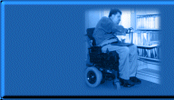 man in wheelchair reaching into file cabinet