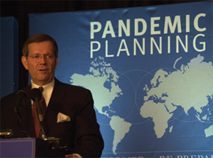 HHS Secretary Michael O. Leavitt addresses a conference on planning for  an eventual influenza pandemic.