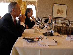 Martin, foreground left, Japanese Chair Keiji Wakabayashi, Ph.D., center, moderated panel discussions. Seated in the background is Diane Griffin, Ph.D., M.D., Alfred and Jill Sommer Professor and Chair, Johns Hopkins Bloomberg School of Public Health.