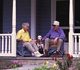 Senior citizens sitting in their front porch
