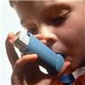 Boy using inhaler device
