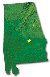 Image of Alabama with a star pinpointing the location of the capital.