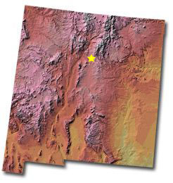 Image of New Mexico with a star pinpointing the location of the capital.