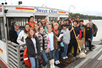 group of students aboard the “Sweet Olive” tour boat in Vicksburg, Mississippi, to take water quality samples on the Yazoo and Mississippi Rivers