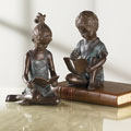 Studious Siblings Sculptures