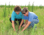 NRCS Resource Conservationist Anita Nein (left) helps (NRCS photo by Joanna Pope)