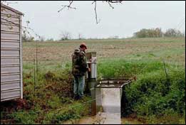 Photo of scientist measuring carbon at Nelson farm near Senatobia, Mississippi