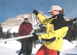 Jenny Castagno and Terry Gonzales taking snow survey readings of sample tube in the Absaroka Mountains, Wyoming