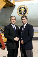 President George W. Bush met Rick Sullivan upon arrival in Denver, Colorado, on Tuesday, June 1, 2004.  Sullivan, vice president of planning operations for Regis Jesuit High School in Aurora, Colorado, is an active volunteer mentor with Boys Hope Girls Hope of Colorado.   