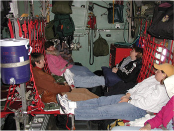 Livermore researchers aboard a U.S. Air Force C-130 transport plane.