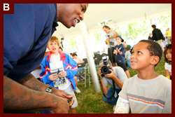 Al Harrington of the NBA Golden State Warriors with a fan at the 2007 National Book Festival