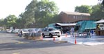 motorists in Tyler, Texas line-up to drop off old tires, batteries, paint, and chemicals during an Earth Day re-cycling event