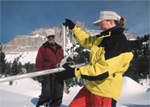 Terry Gonzales and Jenny Castagno taking snow survey readings of sample tube in the Absaroka Mountaians of Wyoming