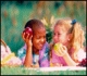 image of two kids eating apples