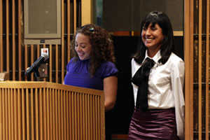 This is a picture of Monica Ramírez, left, and Denise Moreno Ramírez presenting their talk as a collaborative effort