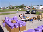 Sunflower RC&D staff from Harper, Kansas, prepare for distribution of  supplies for for Greensburg, Kansas area tornado survivors (NRCS photo — click to enlarge
