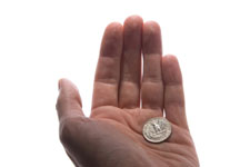 hand holding a quarter