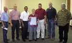 (l. to r.) City of Port Arthur solid waste superintendent Gerald Robinson, NRCS soil conservationist Emil “Trey” Bethke, Port Arthur director of public works John Comeaux, NRCS contract specialist Kathleen Pinckney, NRCS civil engineer Hank Wiederhold, Port Arthur crew supervisor for trash collection Warren Jones, Jr., and Port Arthur assistant superintendent of solid waste collection Rubin Felton