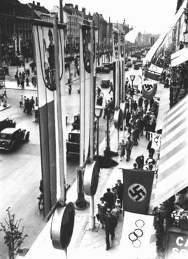 German (swastika) and Olympic flags bedeck Berlin during the Olympic Games. Berlin, Germany, August 1936.