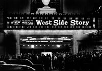 Excited crowds gather outside the Winter Garden Theatre