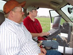 NRCS rangeland management specialists like Chris Tecklenburg (right) can now provide immediate access to natural resource data, such as soils, range sites, aerial photography maps, and Field Office Technical Guide (FOTG) information to help develop a conservation plan and identify appropriate conservation practices on-site for landowners like Derek Zongker 