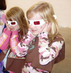 two girl scouts prepare to view three dimensional landscapes anaglyph with 3-D glasses (NRCS photo)