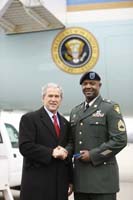 President George W. Bush presented the President’s Volunteer Service Award to Jermaine Malone upon arrival in New Windsor, New York, on Tuesday, December 9, 2008.  Malone, a sergeant first class in the United States Army, is a volunteer with the West Point BOSS program.  To thank them for making a difference in the lives of others, President Bush honors a local volunteer when he travels throughout the United States.  He has met with more than 675 volunteers, like Malone, since March 2002.
