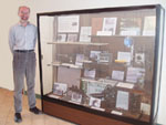 cultural resource specialist Gary Shaffer stands next to Maine’s NRCS 70th anniversary exhibit