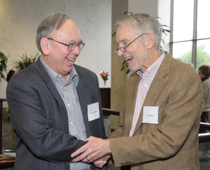 Former NINDS director Dr. Zach Hall (r) is greeted by Dr. Stan Froehner of the University of Washington during Zach Fest.